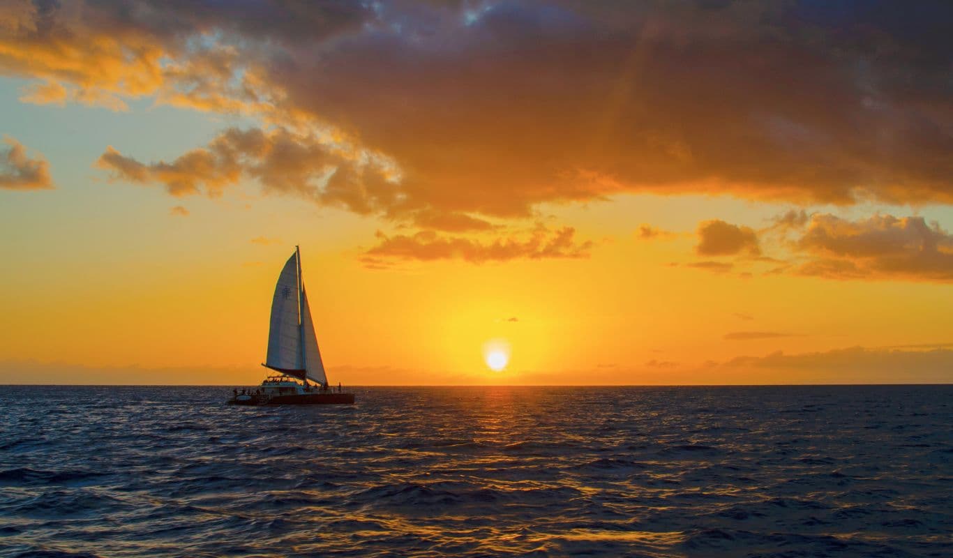 Luxury yacht fleet anchored in the crystal-clear waters of Thassos