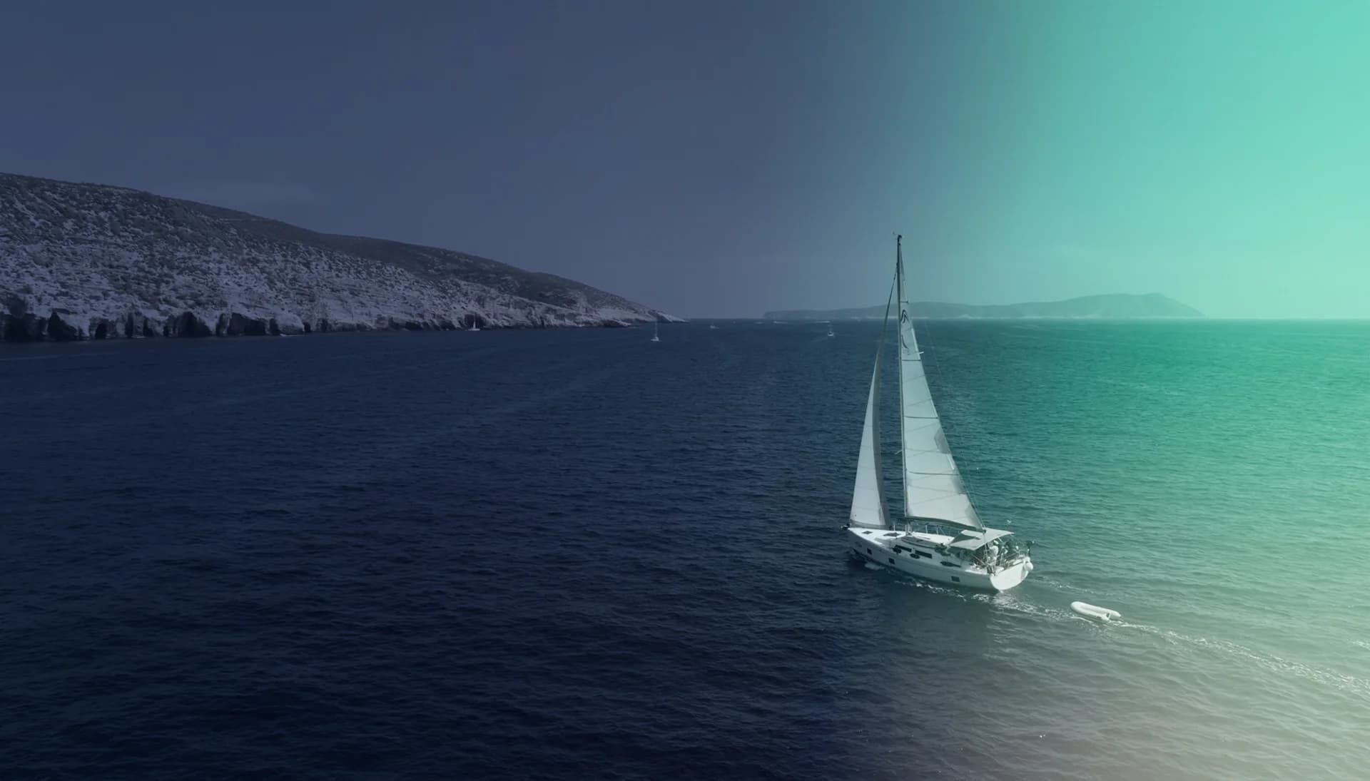 Luxury yacht fleet anchored in the crystal-clear waters of Thassos